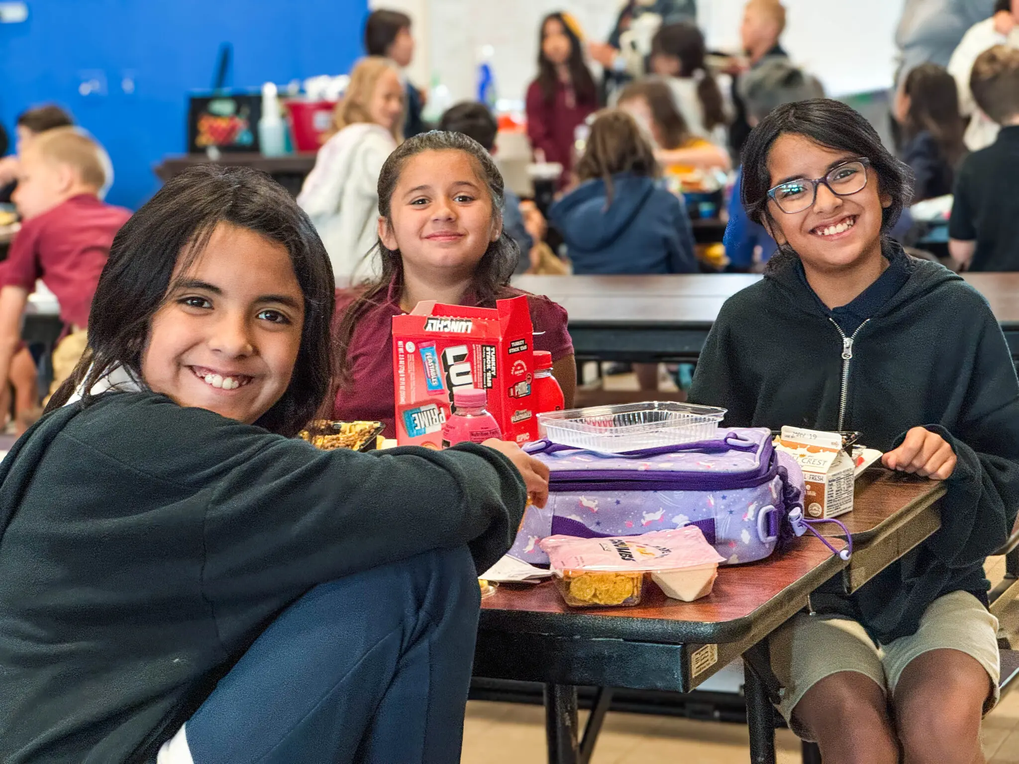 Student making a kind choice during lunch at Carbon Valley Academy, reflecting monthly character education values